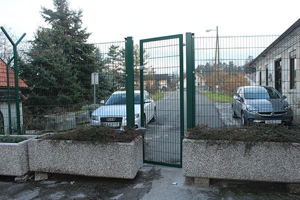 "The Back Door of Fortress Schengen." The fence is expecting its additional barbed wire layer on top of it.
