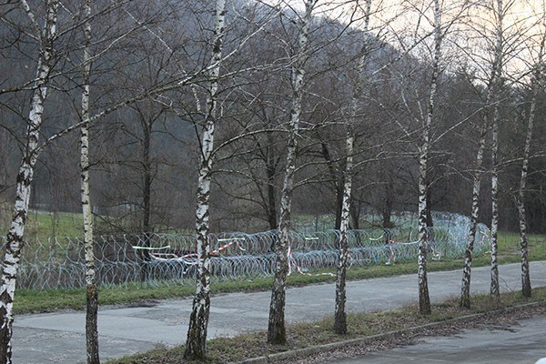 Barbed wire rolls along the Bregana river in in Obrežje.